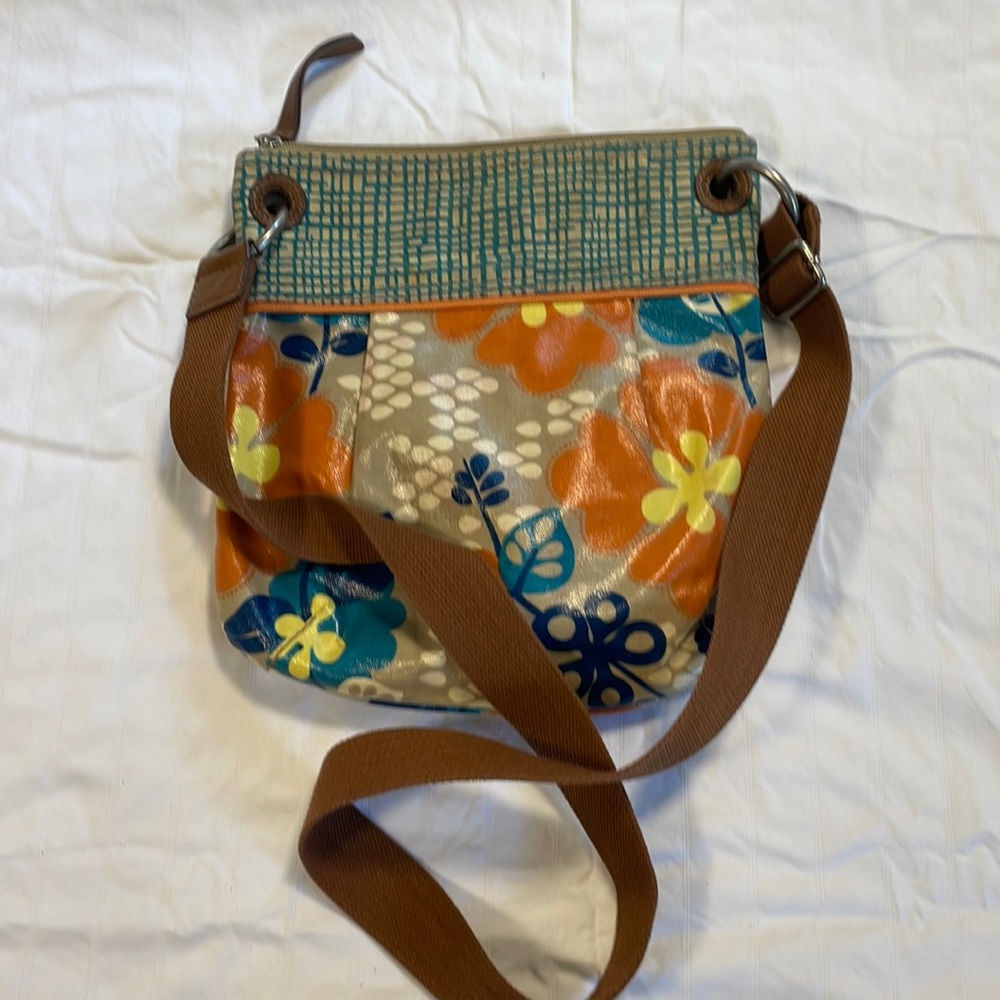 This is a vintage fossil purse.  Crossbody bag